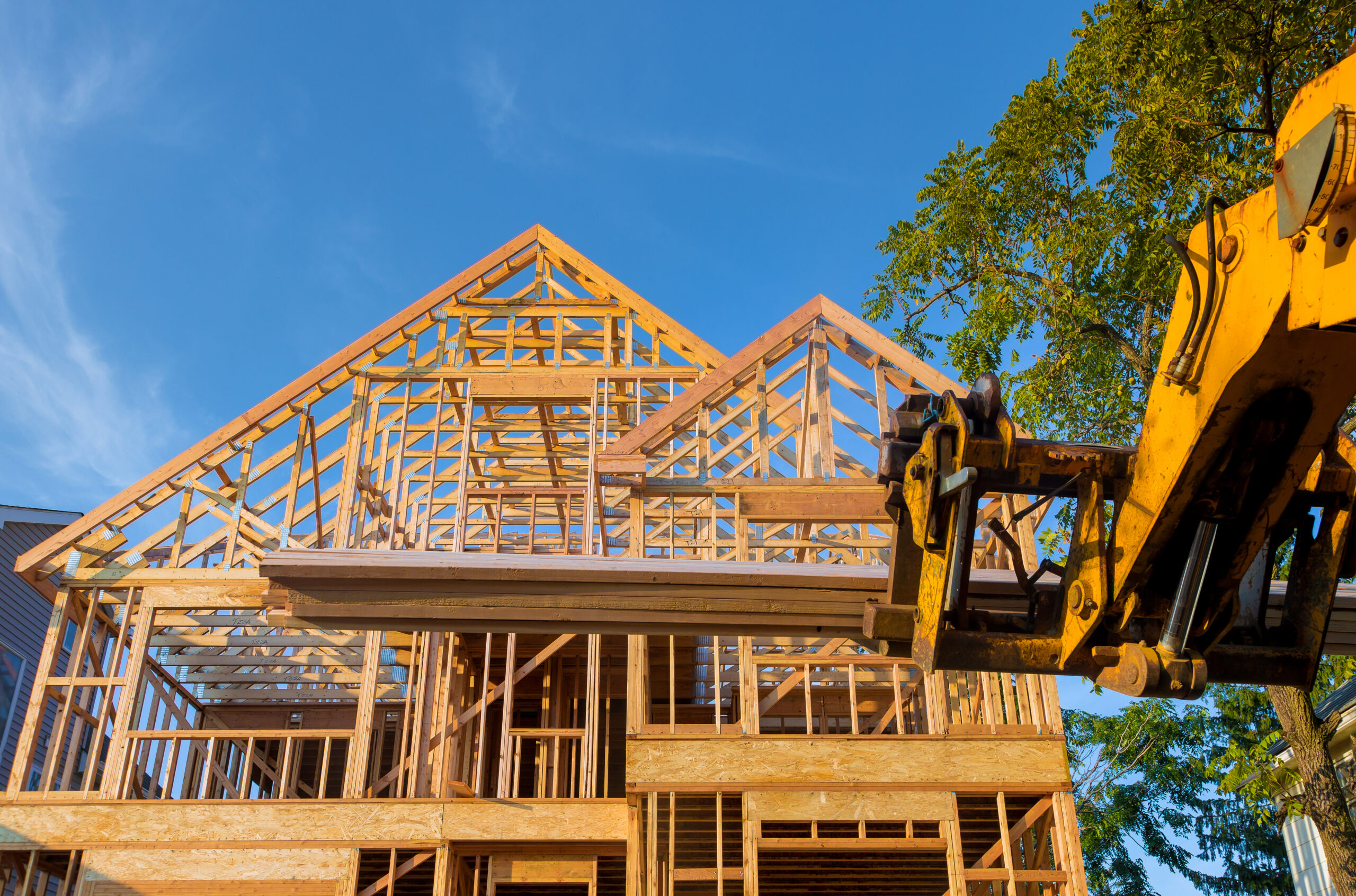 Heavy,Boom,Truck,Machinery,Is,Used,To,Add,The,Roof